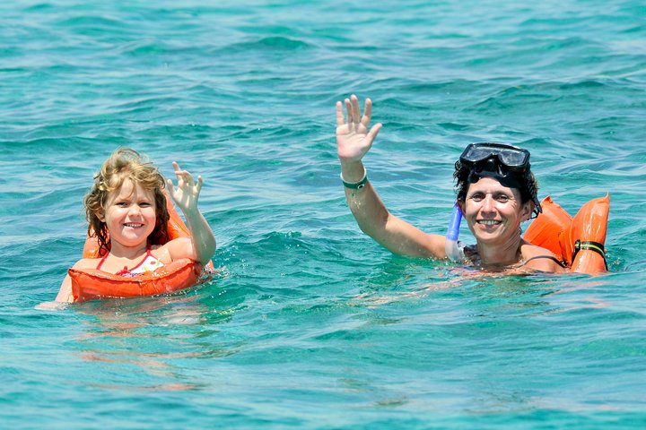 Sailing Experience to Isla Mujeres in a Catamaran with Open Bar Sailing Experience to Isla Mujeres in a Catamaran with Open Bar